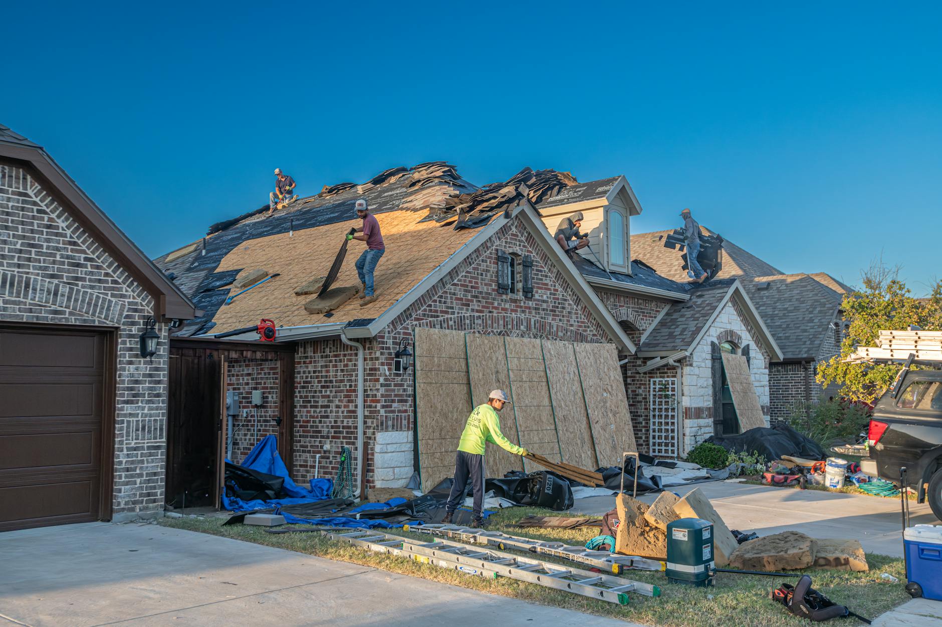 Suburban Texas home with shingle roof at golden hour